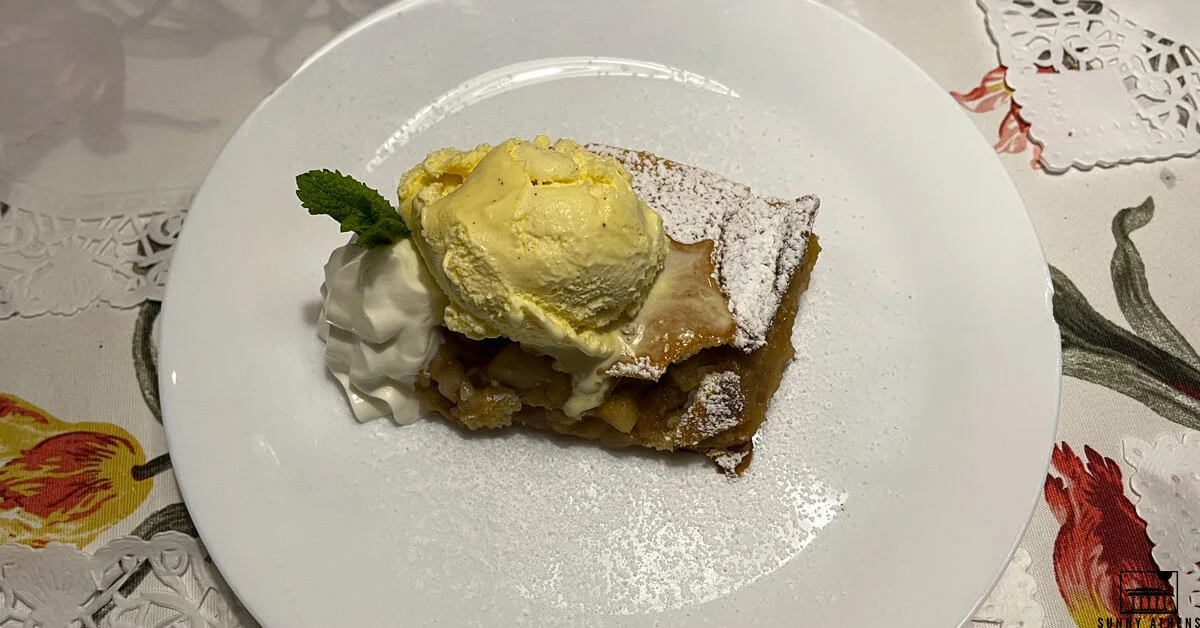 Traditional Polish food: a scoop of icecream on top of a hot apple pie