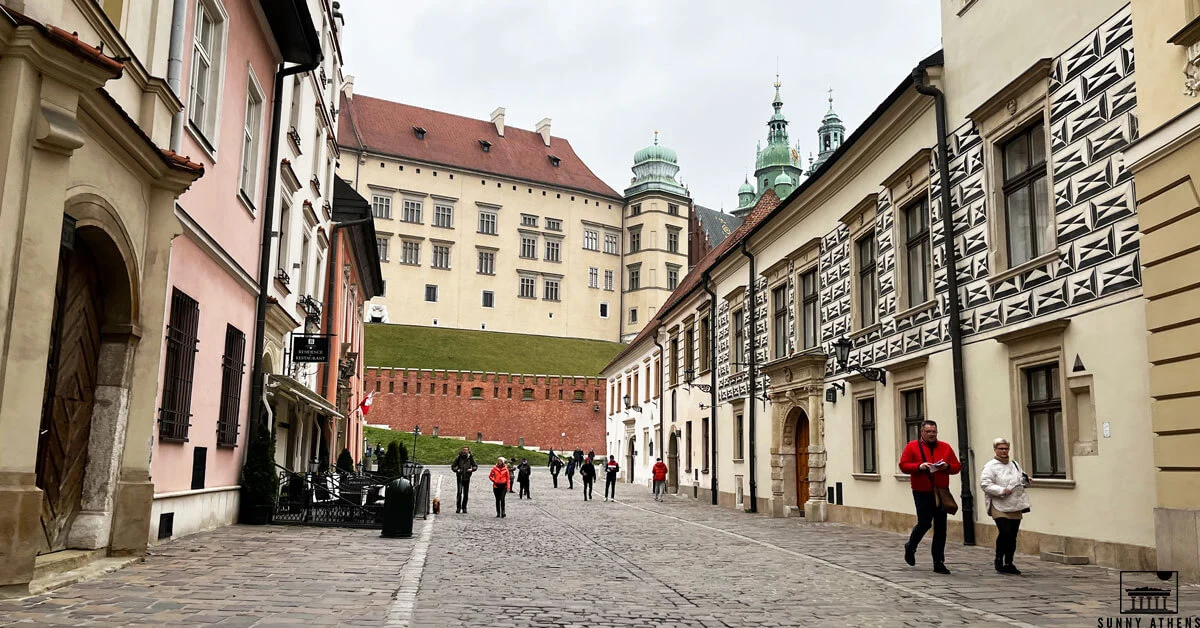 People walking on Grodzka Street