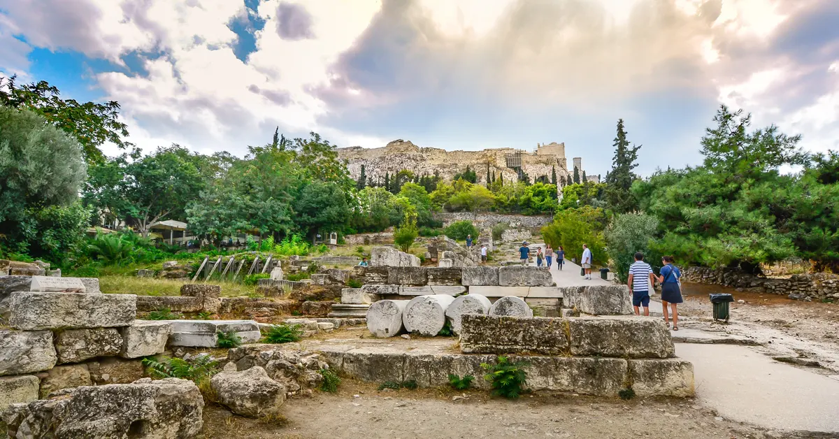 People walking at Ancient Agora, right under the Acropolis