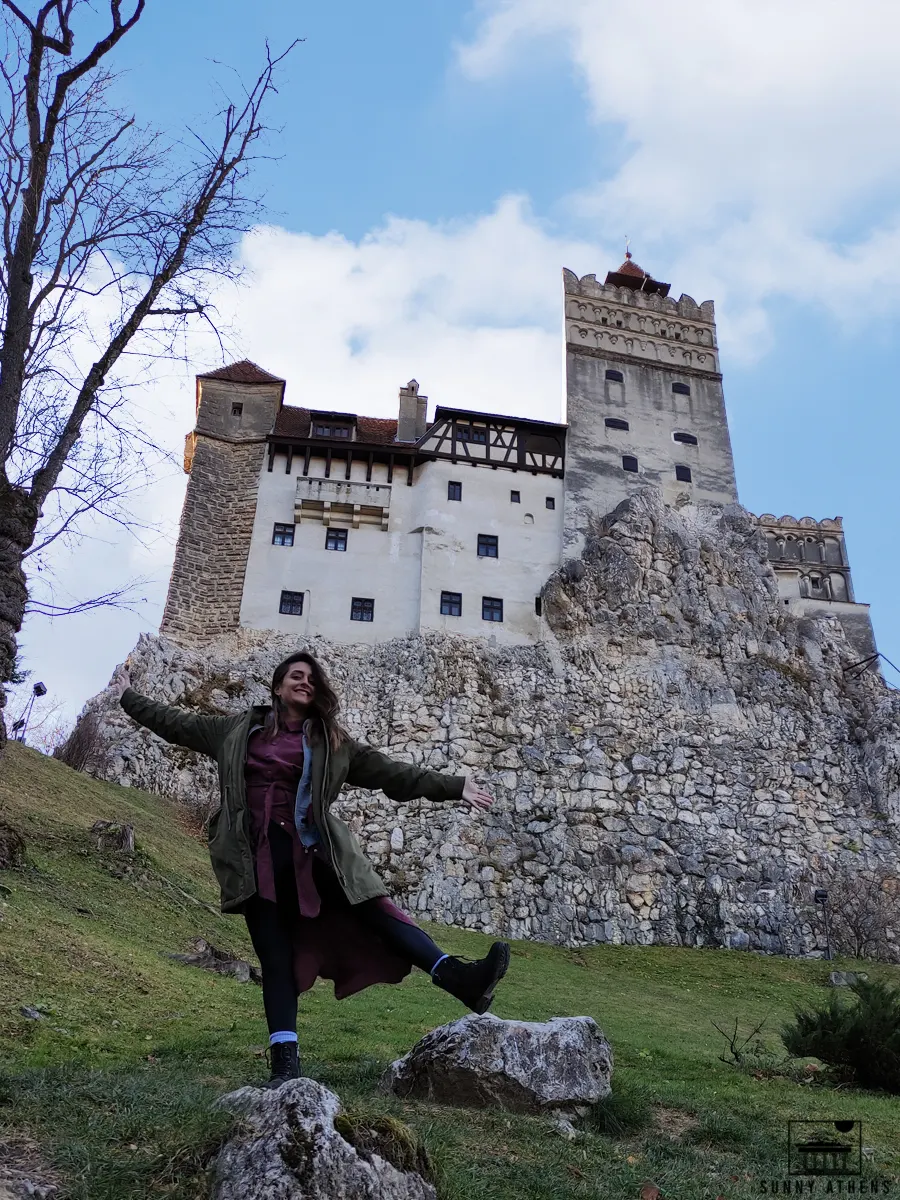 Unique Experiences in Brasov: Chrysavgi posing in front of Bran Castle.