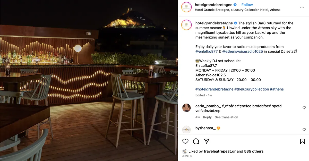 GB Roof Garden at night with the Lycabettus Hill in the background.