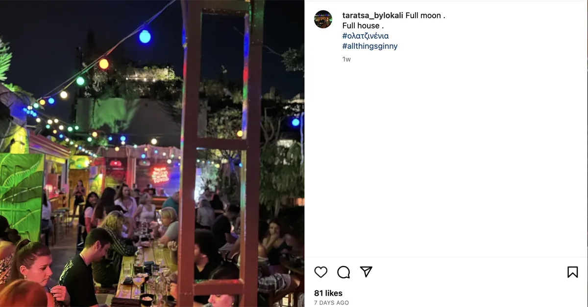 People enjoying the evening at the Tolokali rooftop bar.