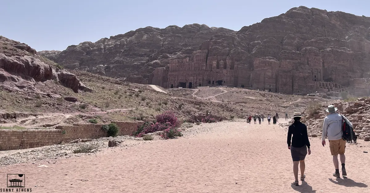 7 Days in Jordan Itinerary: visitors exploring the remarkable ruins of Petra in Jordan.