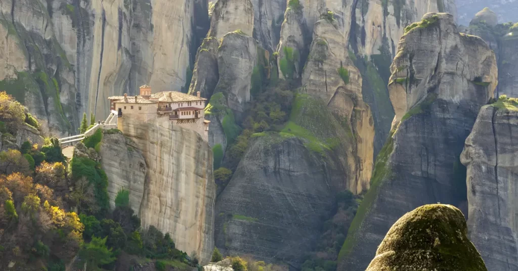 Best day trips from Athens: A monastery situated on top of a towering rock formation at the breathtaking Meteora.