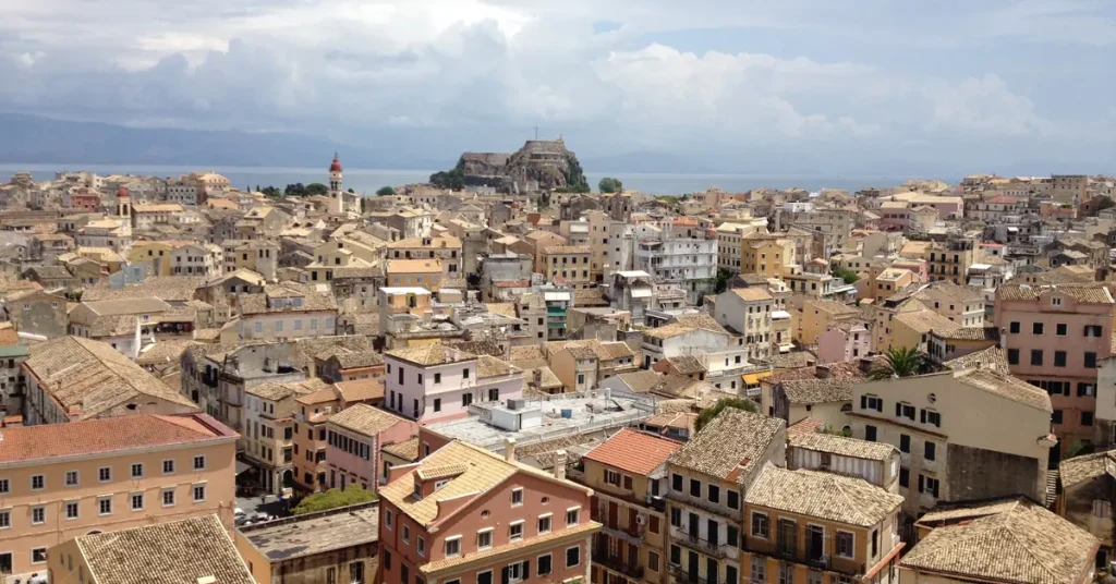 Panoramic view of Corfu town showing packed traditional houses and the old fortress.