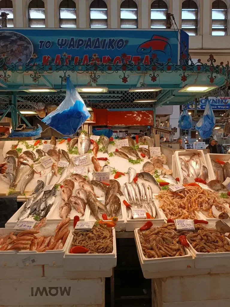 Local markets in Athens: fresh fishes, octapuses, shrimps and others seafood sold in Athens Fish Market.