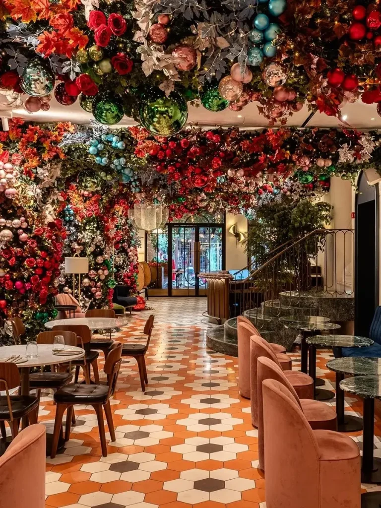 5-Star Hotels in Athens Greece: The multicolor flower decorated bar of Gatsby Athens hotel.