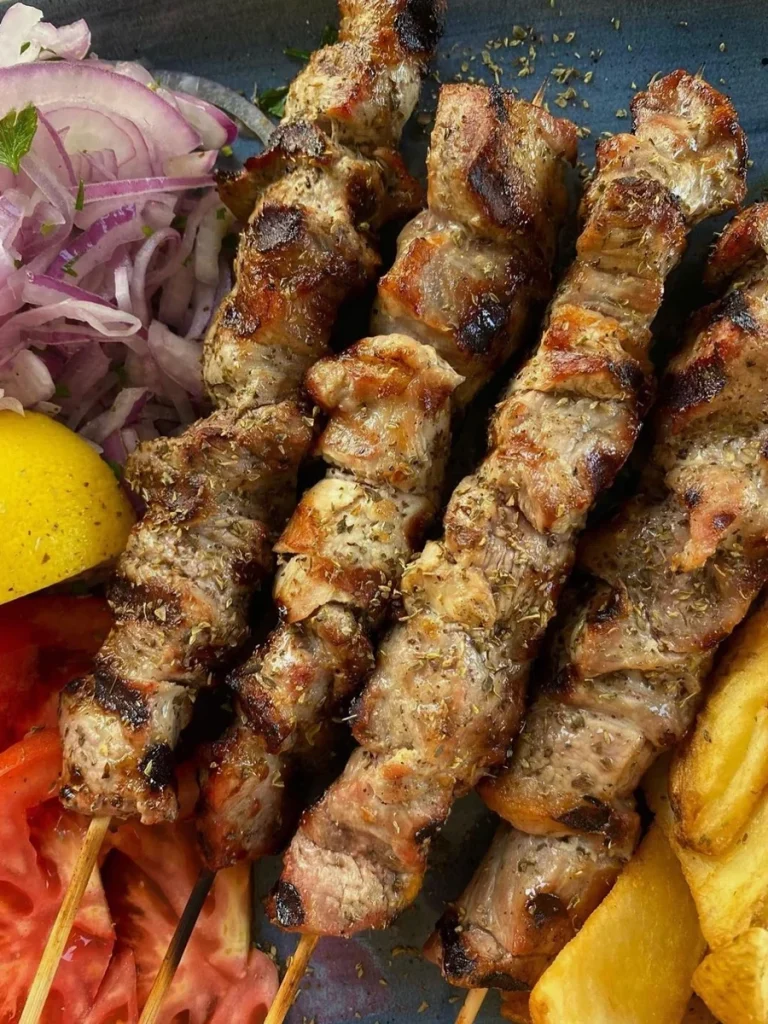 Souvlaki kalamaki. A traditional greek street food plate.