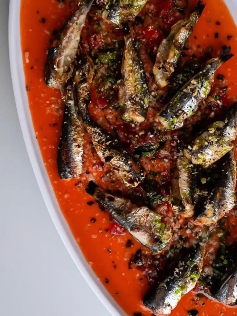 Grilled sardines in a gourmet edition from the menu of Mario Restaurant in Paros Greece. 