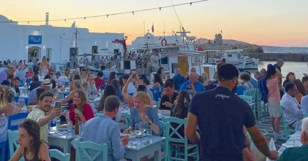 The crowdy small port of Naoussa in Paros Greece.