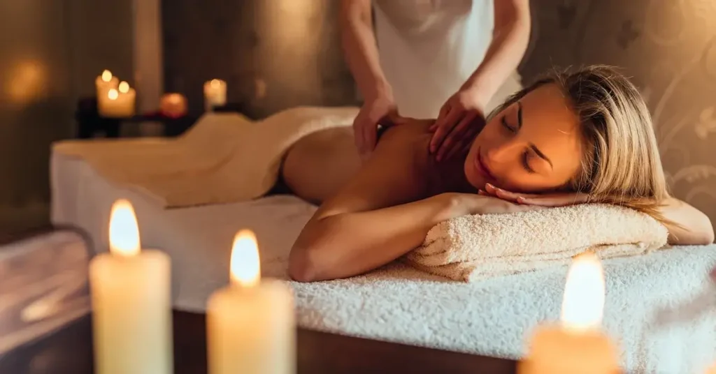 A woman enjoying massage at a spa of hotel Parocks in Paros Greece.