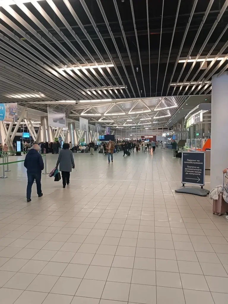 People walking at the international airport in Sofia, Bulgaria.