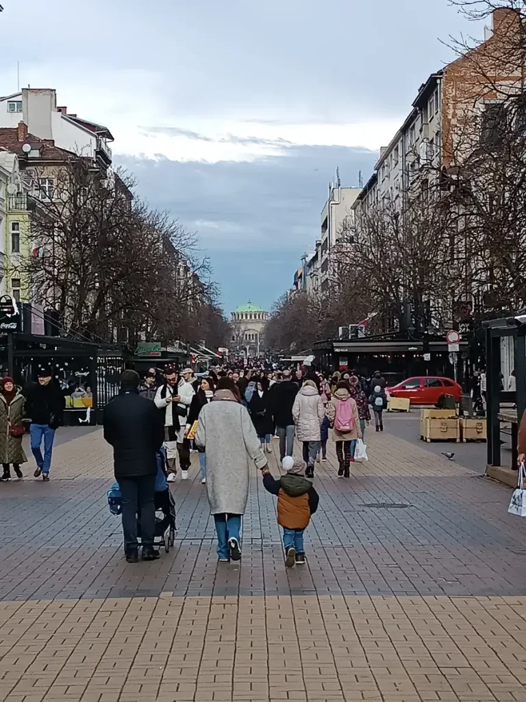 Crowds walking along the famous Vitosha Blvd in central Sofia, a highlight for any 2-day itinerary.