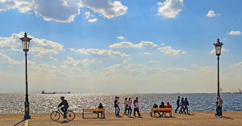 People strolling on the seafront promenade of Thessaloniki.