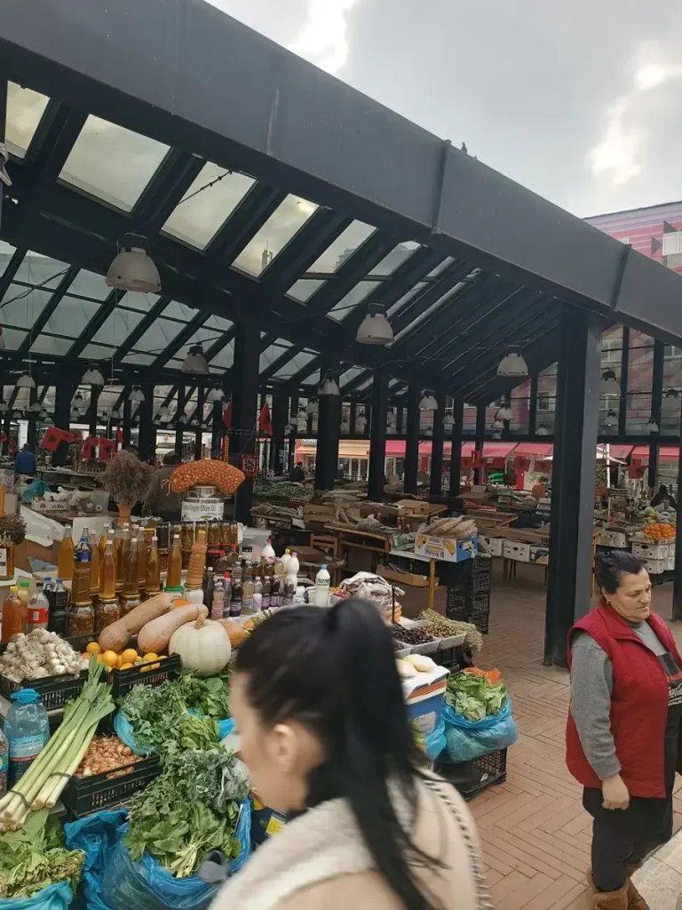 Women checking products at the New Bazaar of Tirana, a great addition to your 2 days itinerary.