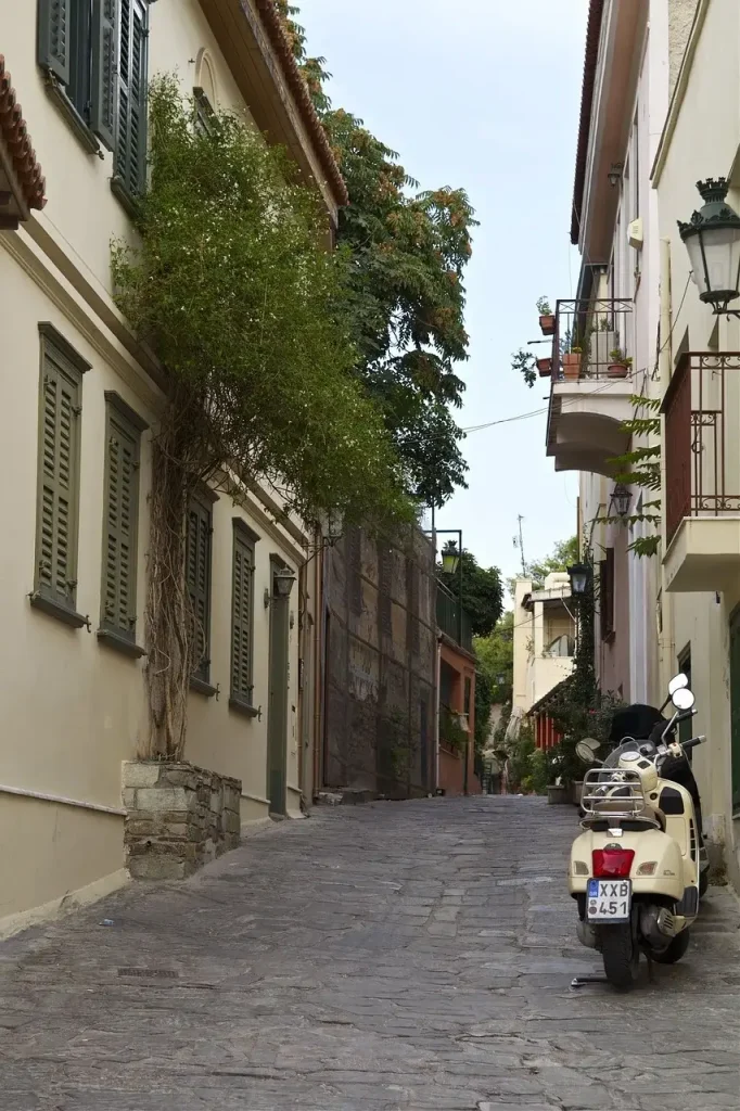 A picturesque small street in the amazing neighborhood of Plaka in Athens Greece.